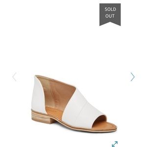 WHITE ASYMMETRICAL WRAP FLATS